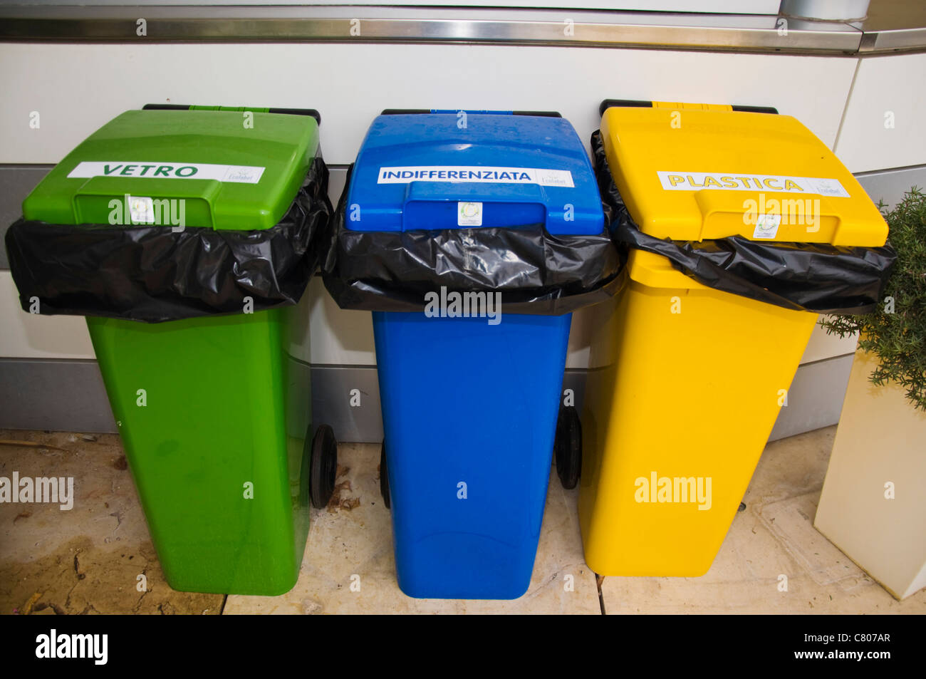 Colour coded recycling bins Stock Photo