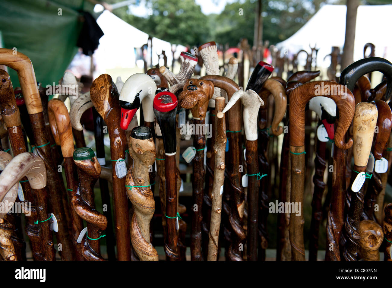 Hand made walking sticks at Weald of Kent craft show in summer Stock Photo