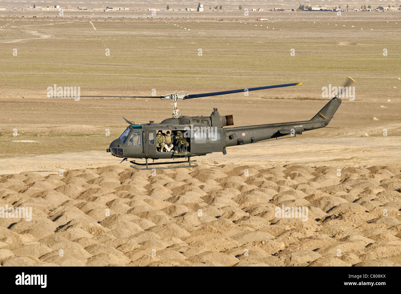 Italian Army AB205MEP utility helicopter in flight over Shindand
