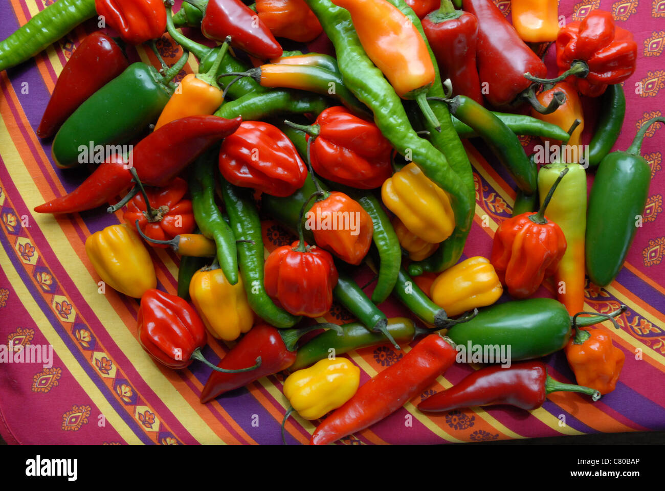Peppers on colorful cloth hi-res stock photography and images - Alamy