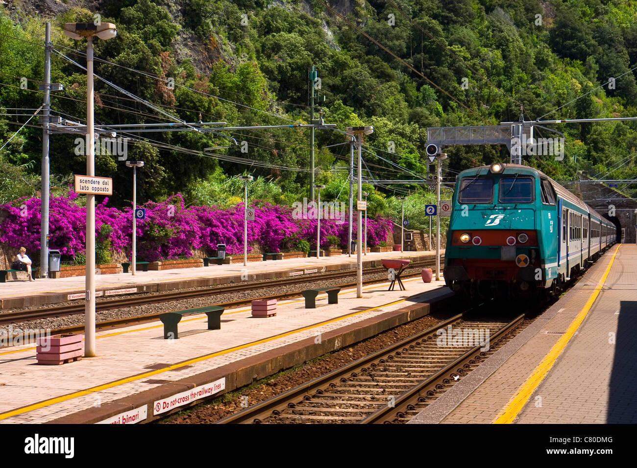 Approaching train (Trenitalia) to station at Monterosso in Cinque Terre, Liguria Italy Stock Photo