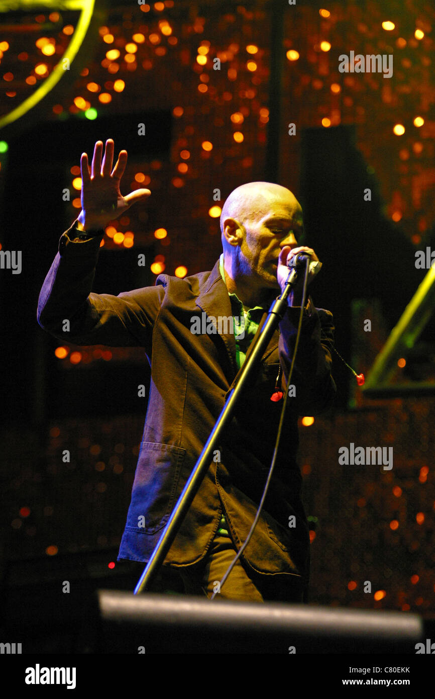 REM performing on the Pyramid stage at the Glastonbury Festival 2003