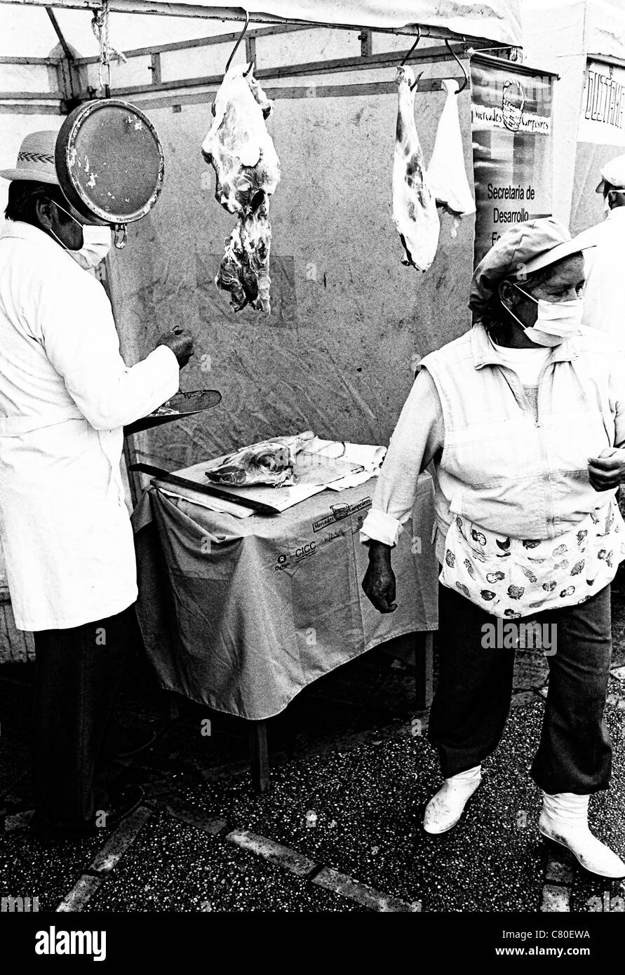 Couple selling meat in the marketplace. Soracá, Boyacá, Colombia, South America Stock Photo
