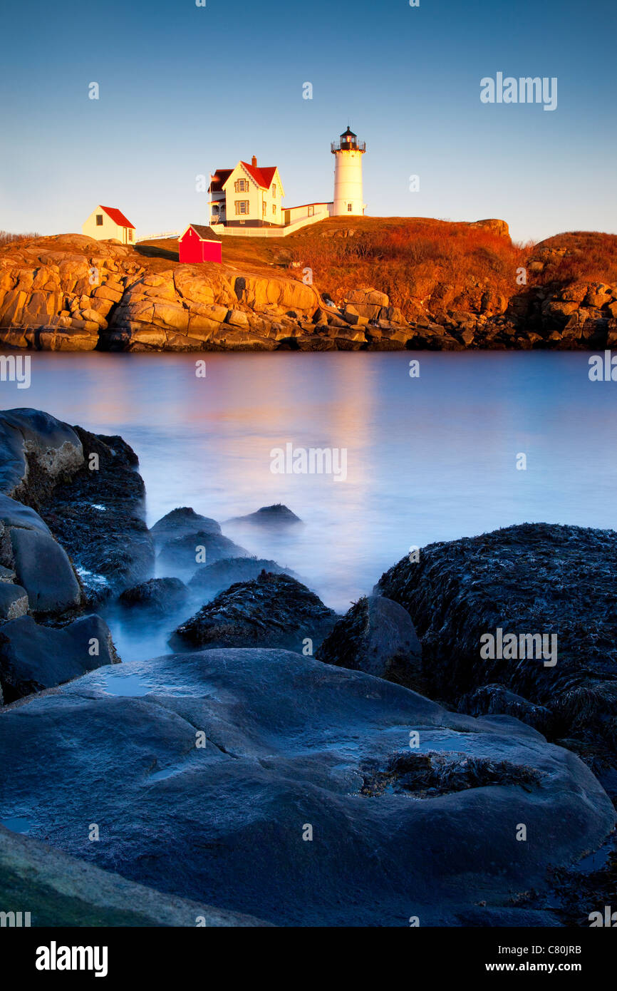 Sunset at Nubble Lighthouse at Cape Neddick, Maine USA Stock Photo