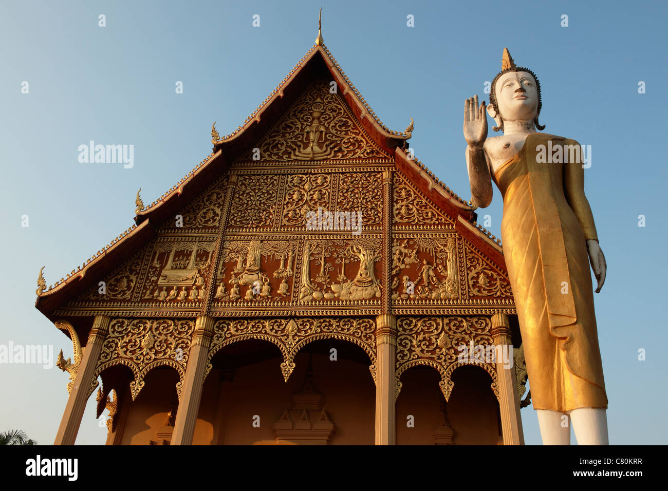 Laos, Vientiane, Pha That Luang Buddhist Stupa Temple, Statue Stock Photo