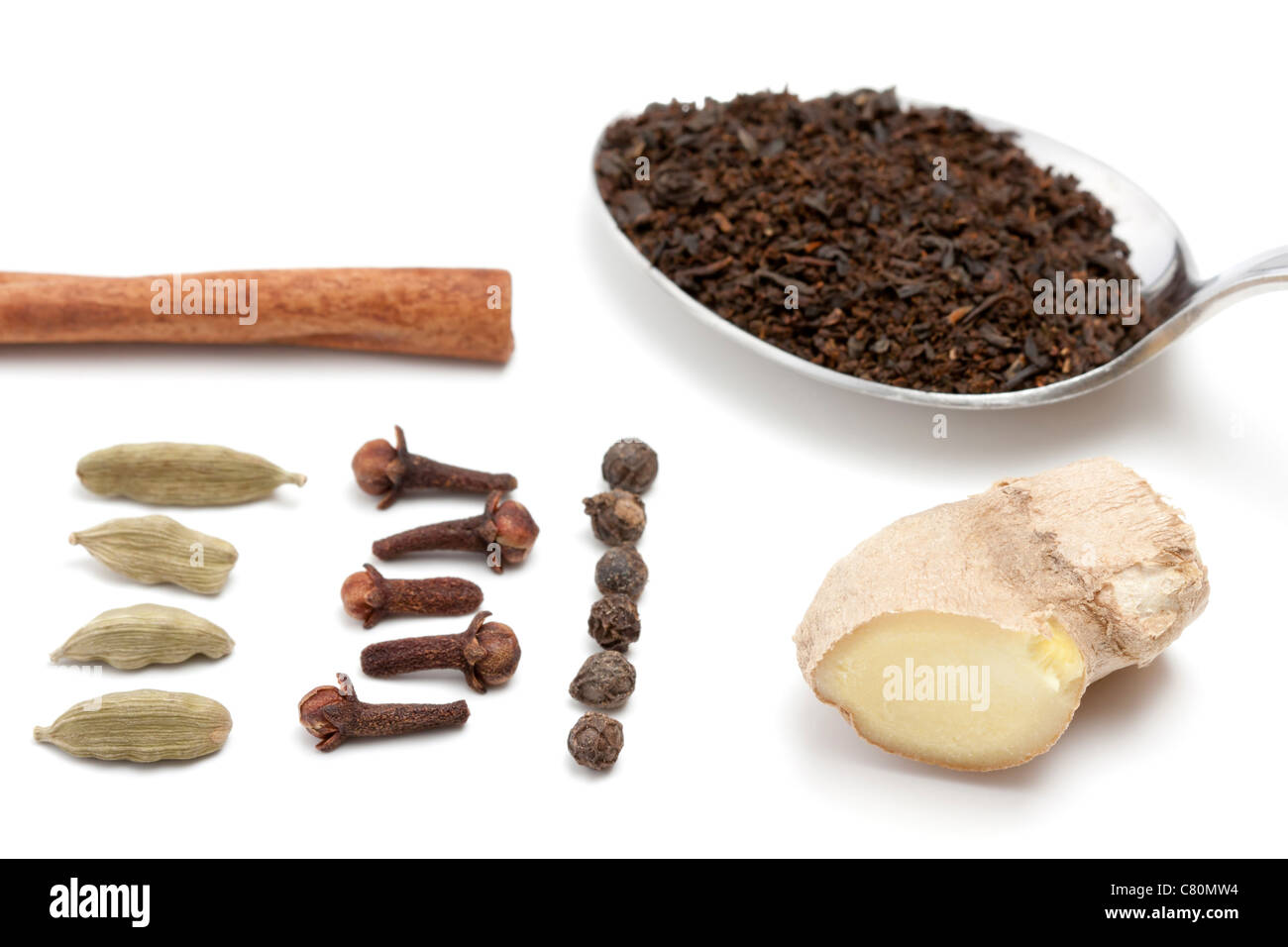 Typical ingredients for Indian Chai tea like cloves, pepper, cardamom