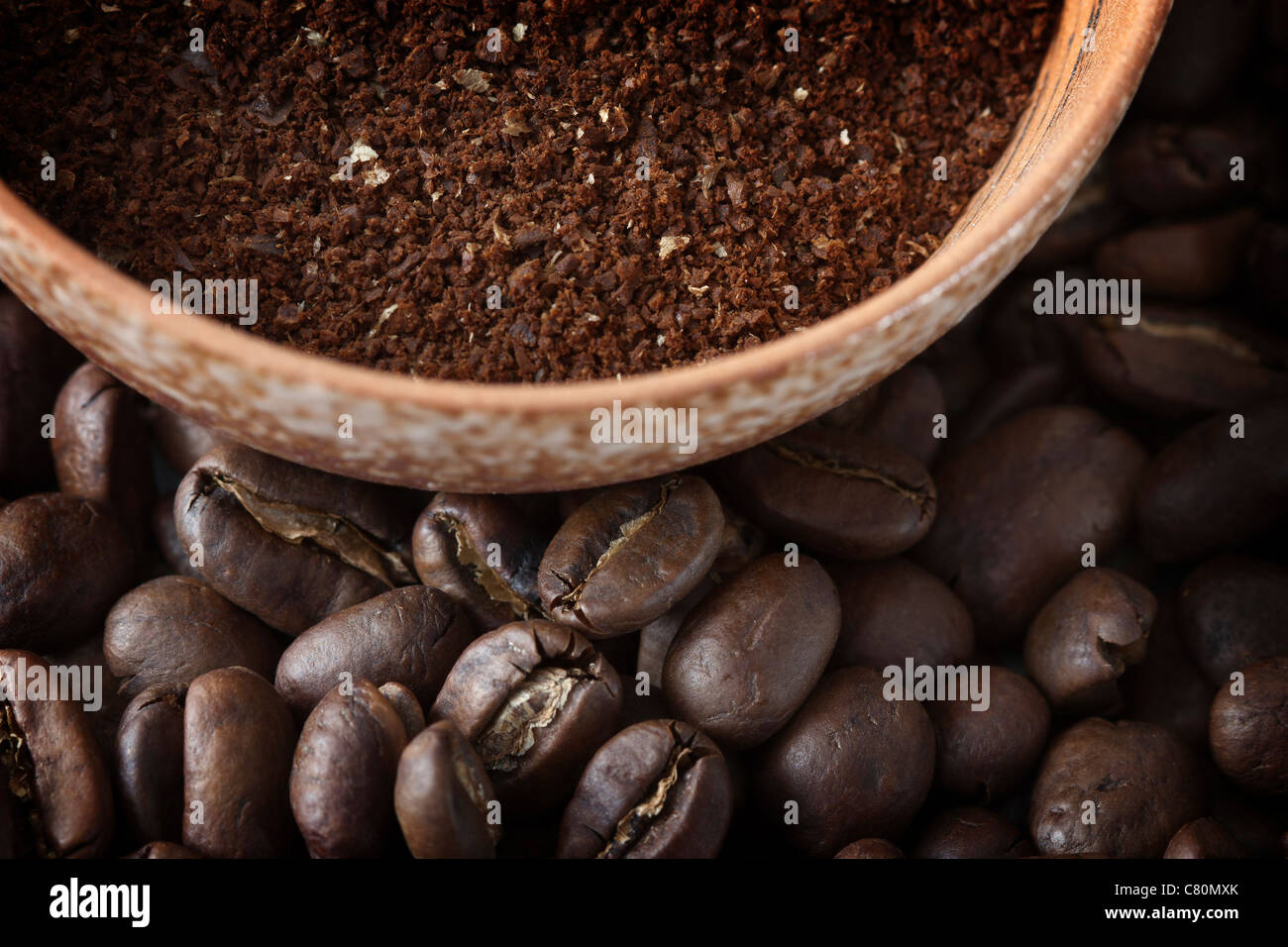 Full frame image of coffee beans and powdered coffee. Stock Photo