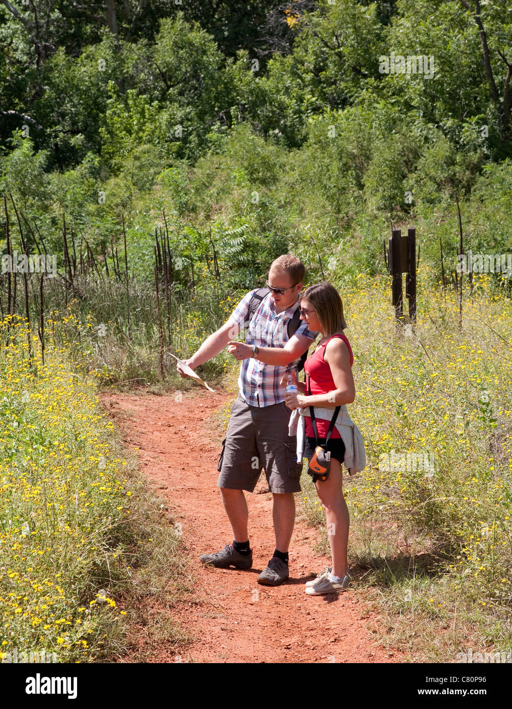 Two young female hikers map hi-res stock photography and images - Alamy