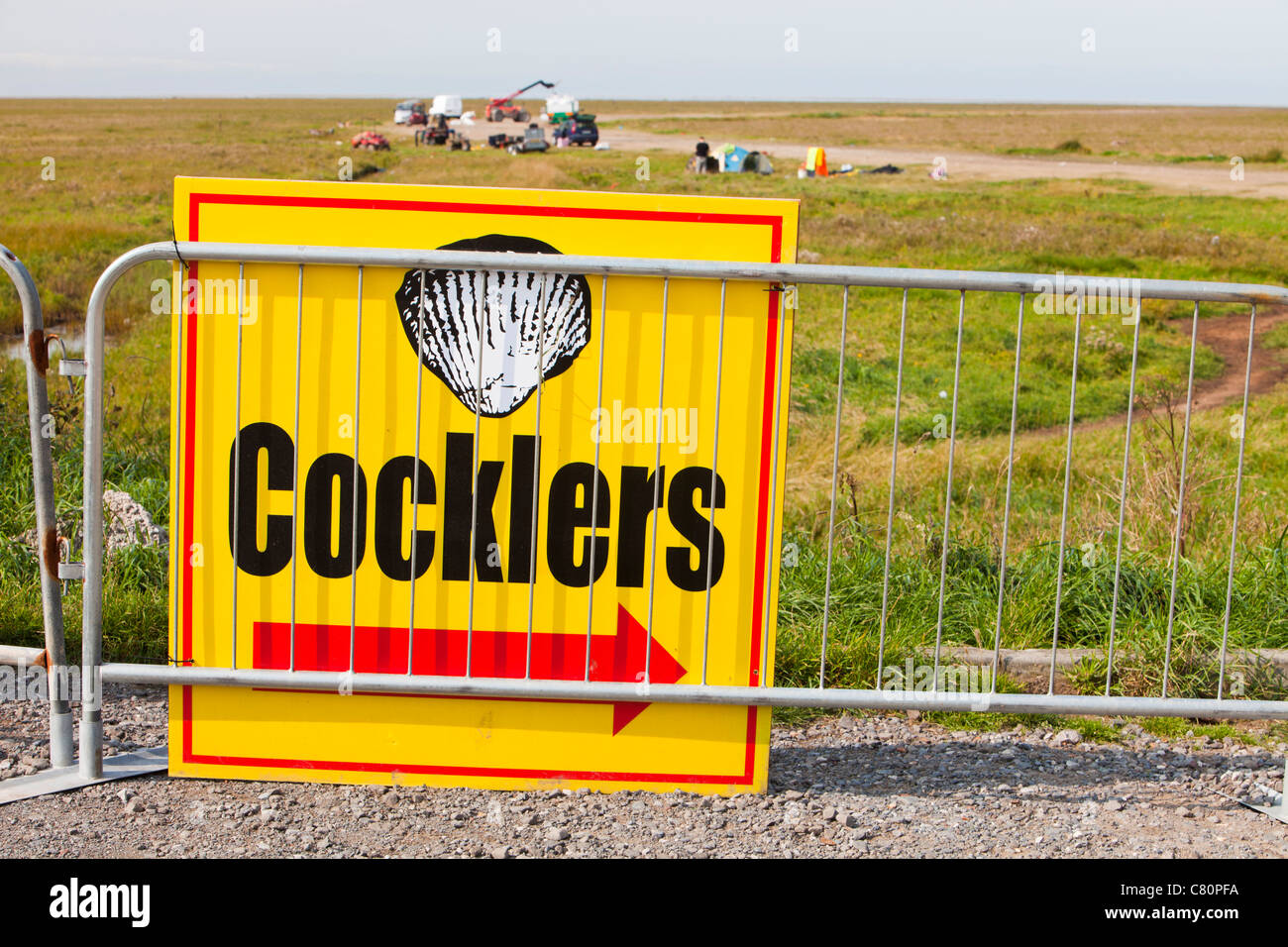 A sign for Cocklers exploiting the shell fish on the Ribble estuary near Southport, Lancashire, UK. Stock Photo