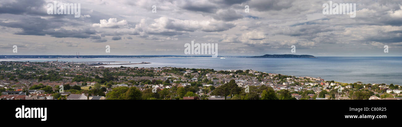 Evening view northwards from Dalkey Quarry, over Dublin Bay, including distant Irish Ferries ship, Ulysses, entering harbour Stock Photo
