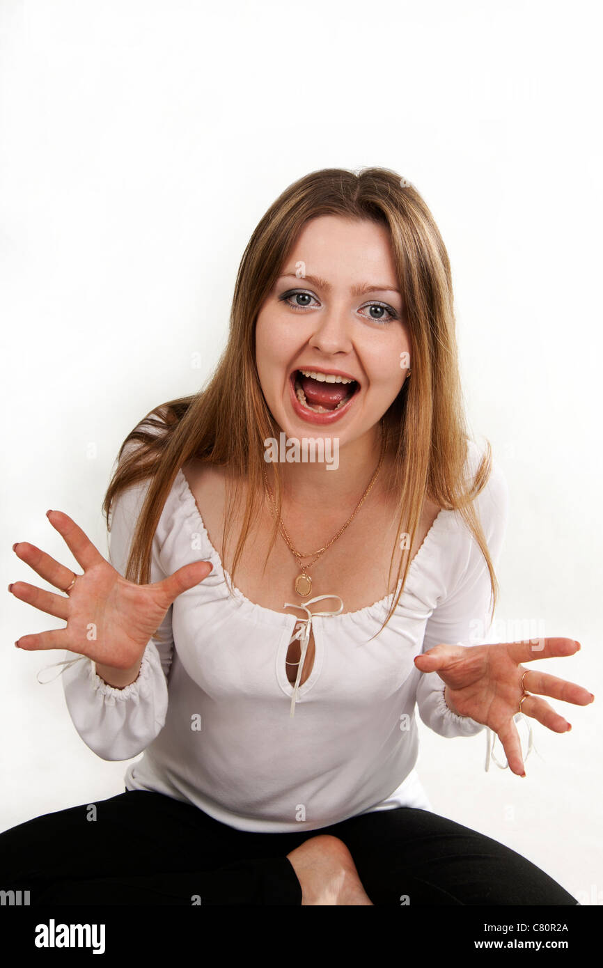 Woman shows surprise, unexpectedness and Joy Stock Photo - Alamy