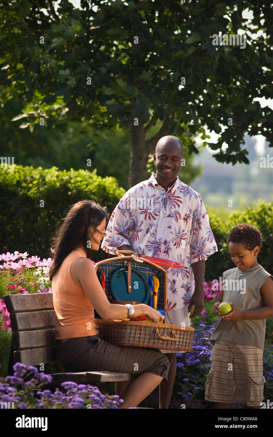 MIxed couple having a picnic Stock Photo
