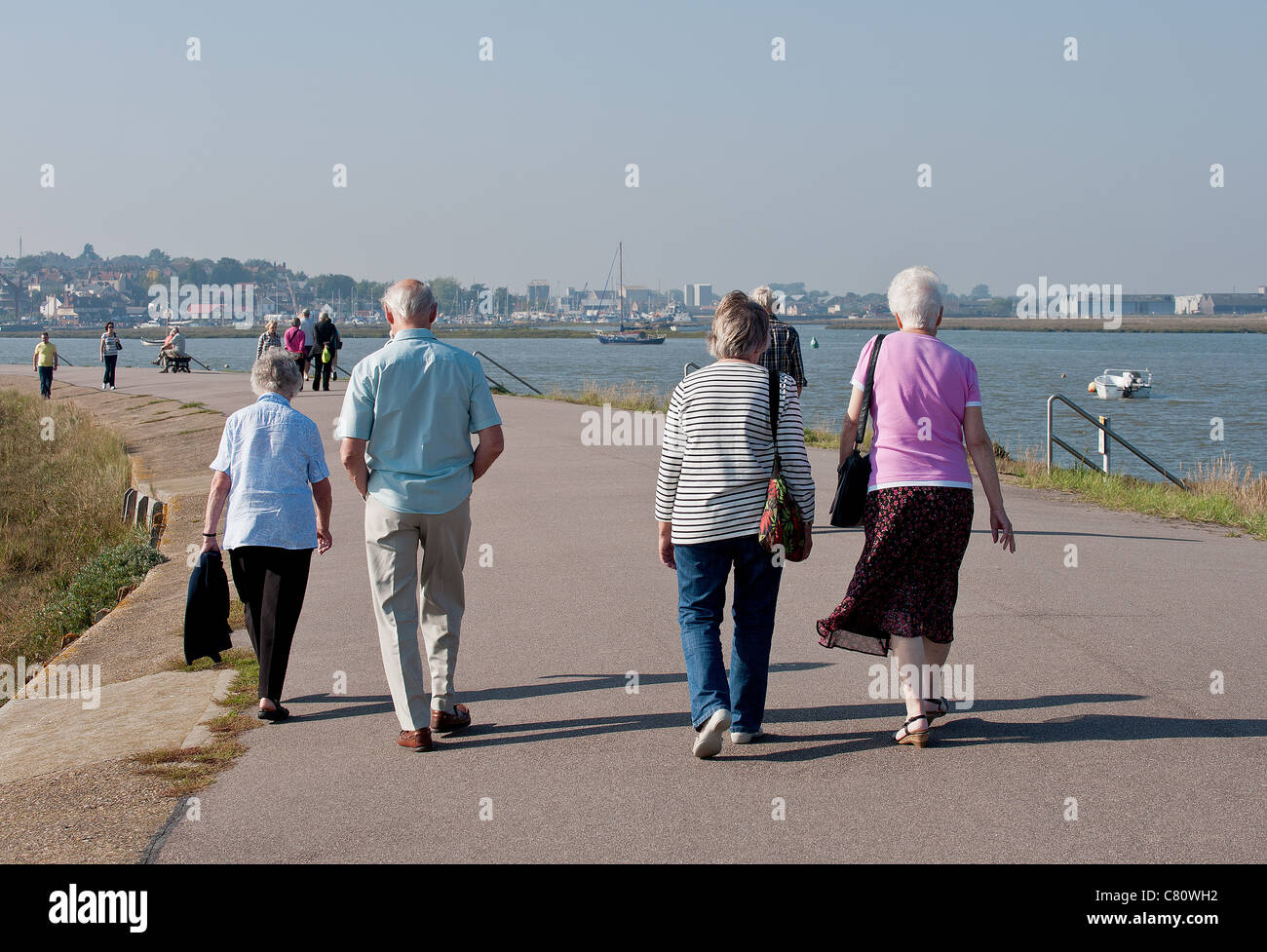 People walking along the promenade in Maldon in Essex Stock Photo - Alamy