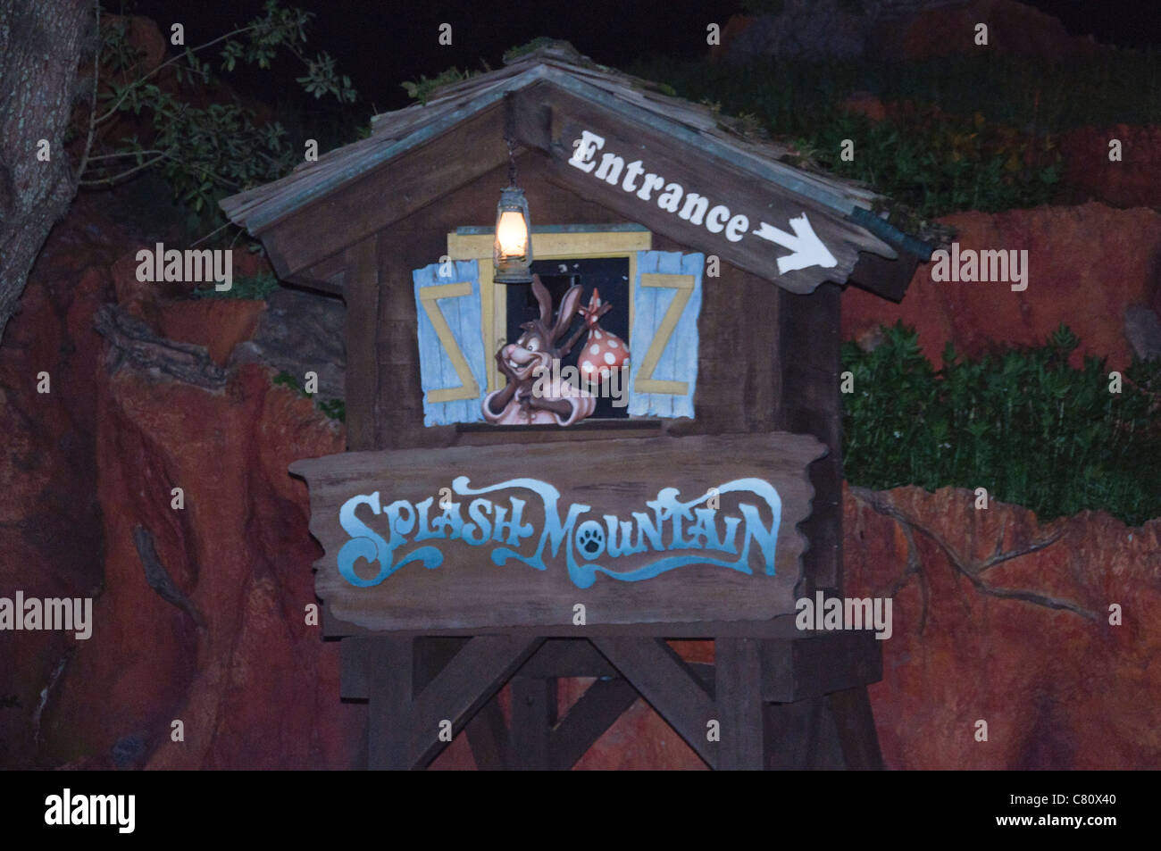 entrance to the splash mountain ride at night time dusk Stock Photo Alamy