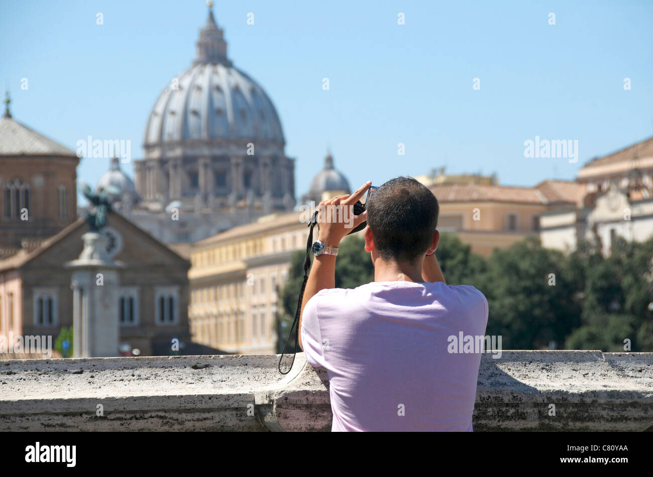 Tourist in Rome taking a photo of St. Peter's Basilica, Vatican City, Rome, Italy, Europe Stock Photo