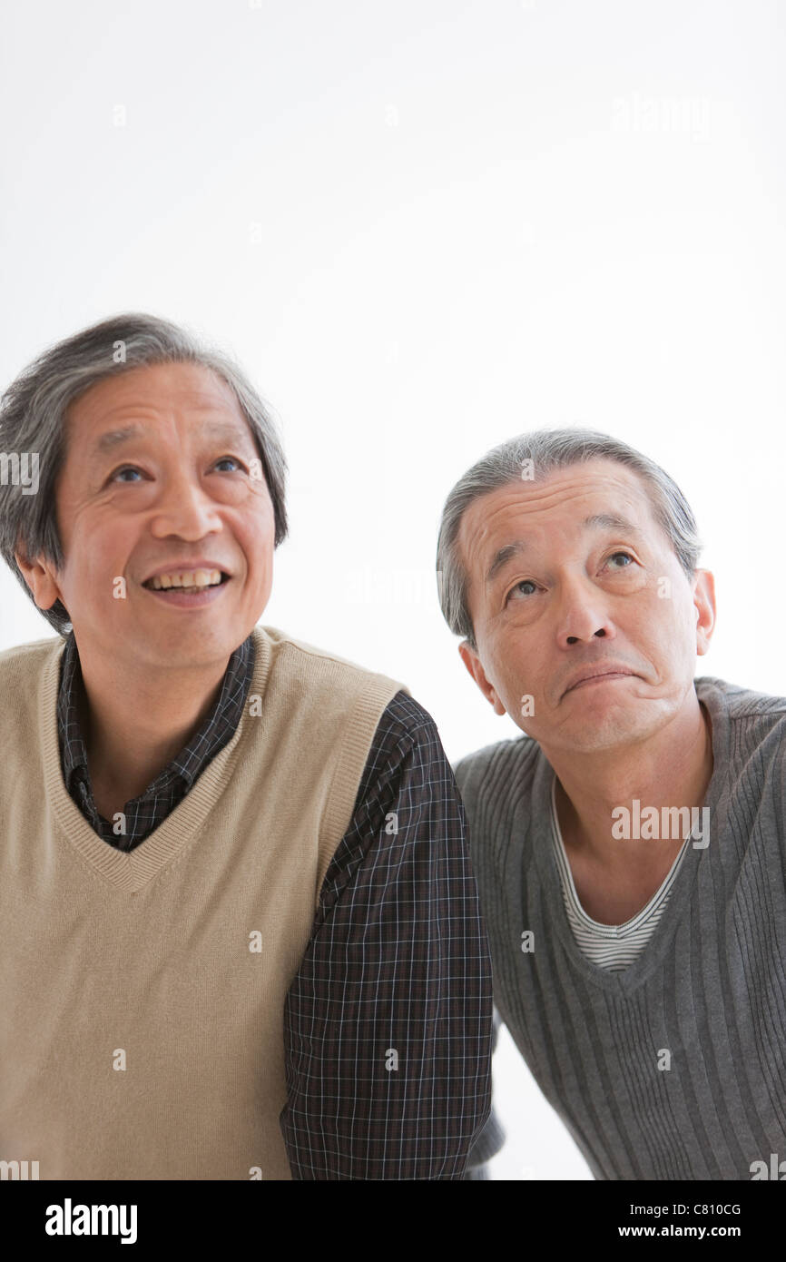 Two Senior Men Looking Up Stock Photo - Alamy