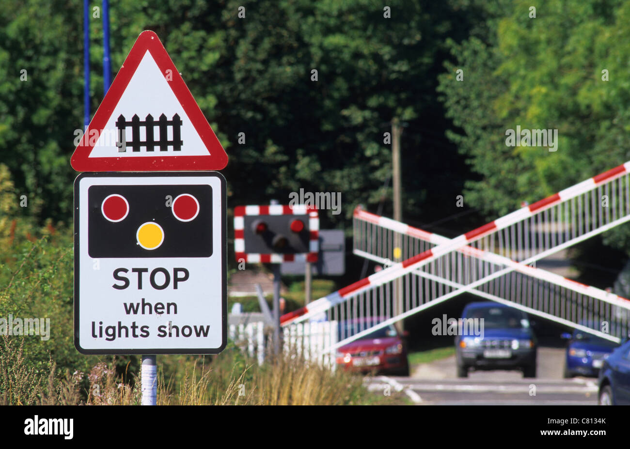 Cars Waiting By Level Crossing As Lights Flash And Barriers Descend Warning Of Approaching Train Near Leeds Yorkshire Uk Stock Photo Alamy Cars Waiting By Level Crossing As Lights Flash And Barriers Descend Warning Of Approaching Train Near Leeds Yorkshire Uk Stock Photo Alamy