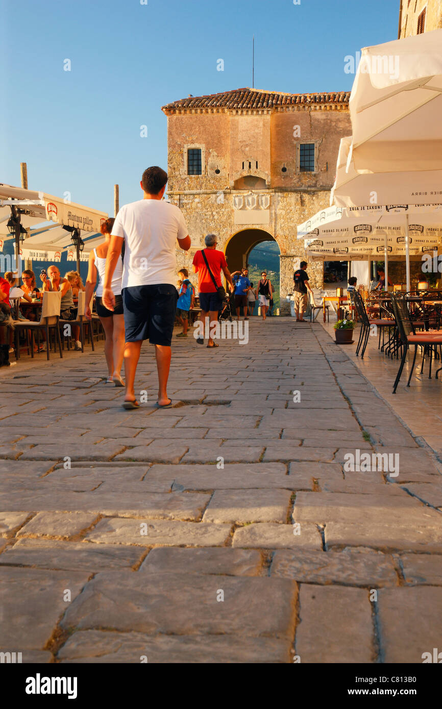 Tourists in old town Motovun in Istria, Croatia Stock Photo