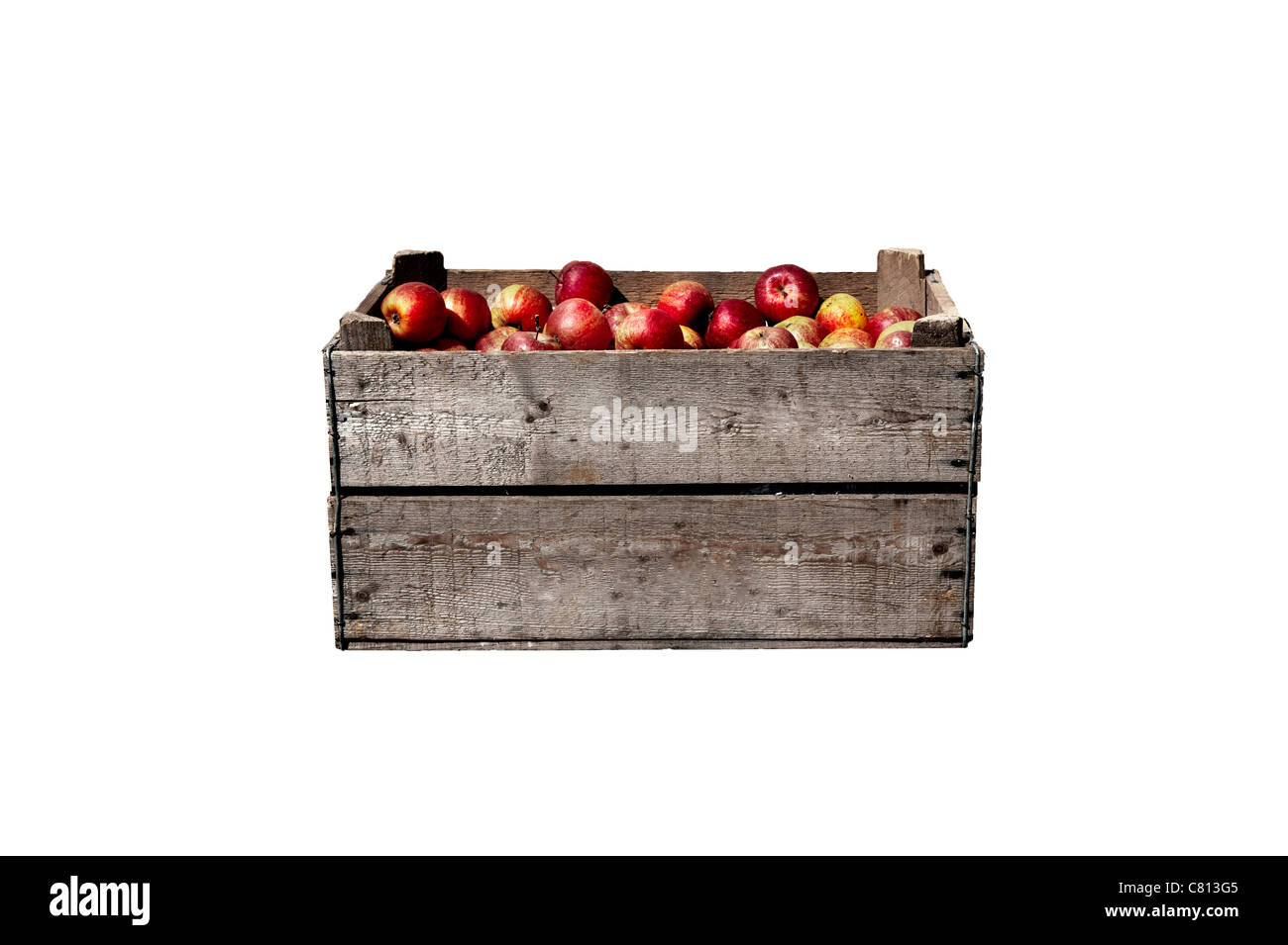 Bushel box with red apples in. Traditional fruit storage method Stock