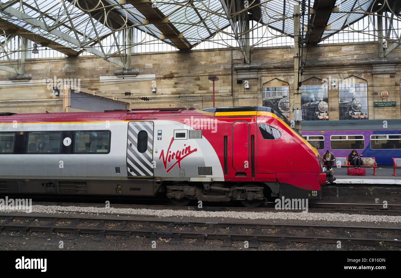 Virgin Train arriving at Carlisle Railway Station Stock Photo
