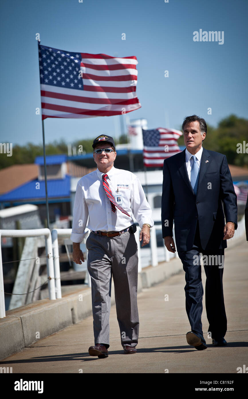 Republican presidential candidate Mitt Romney walks with USS Yorktown Director Mac Burdette (L) during a visit to the USS Yorkto Stock Photo