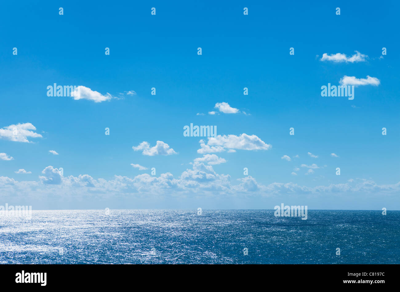 Blue Sky Over Sea Stock Photo - Alamy