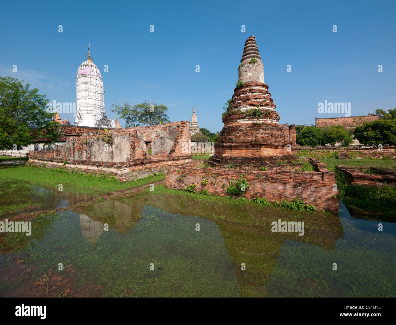 Ancient temple ruins flooded during the monsoon season in Ayuttaya, Thailand Stock Photo