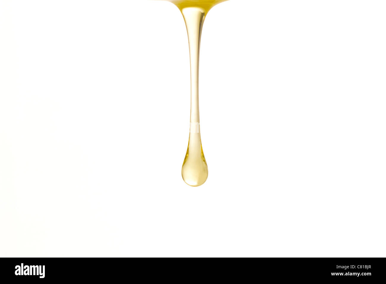 Single Drop of Honey Stock Photo