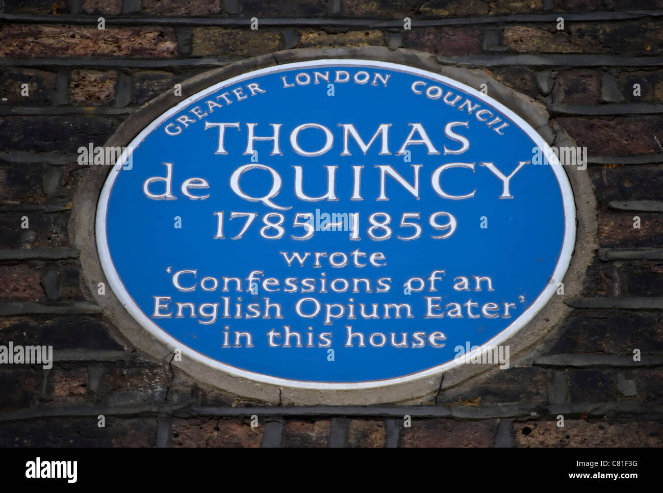 misspelt blue plaque marking the house where thomas de quincey, wrote confessions of an english opium eater, tavistock street, london Stock Photo