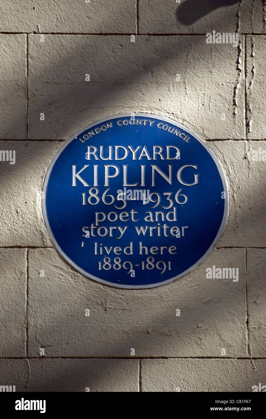 blue plaque marking a home of poet and story writer rudyard kipling, villiers street,  london, england Stock Photo