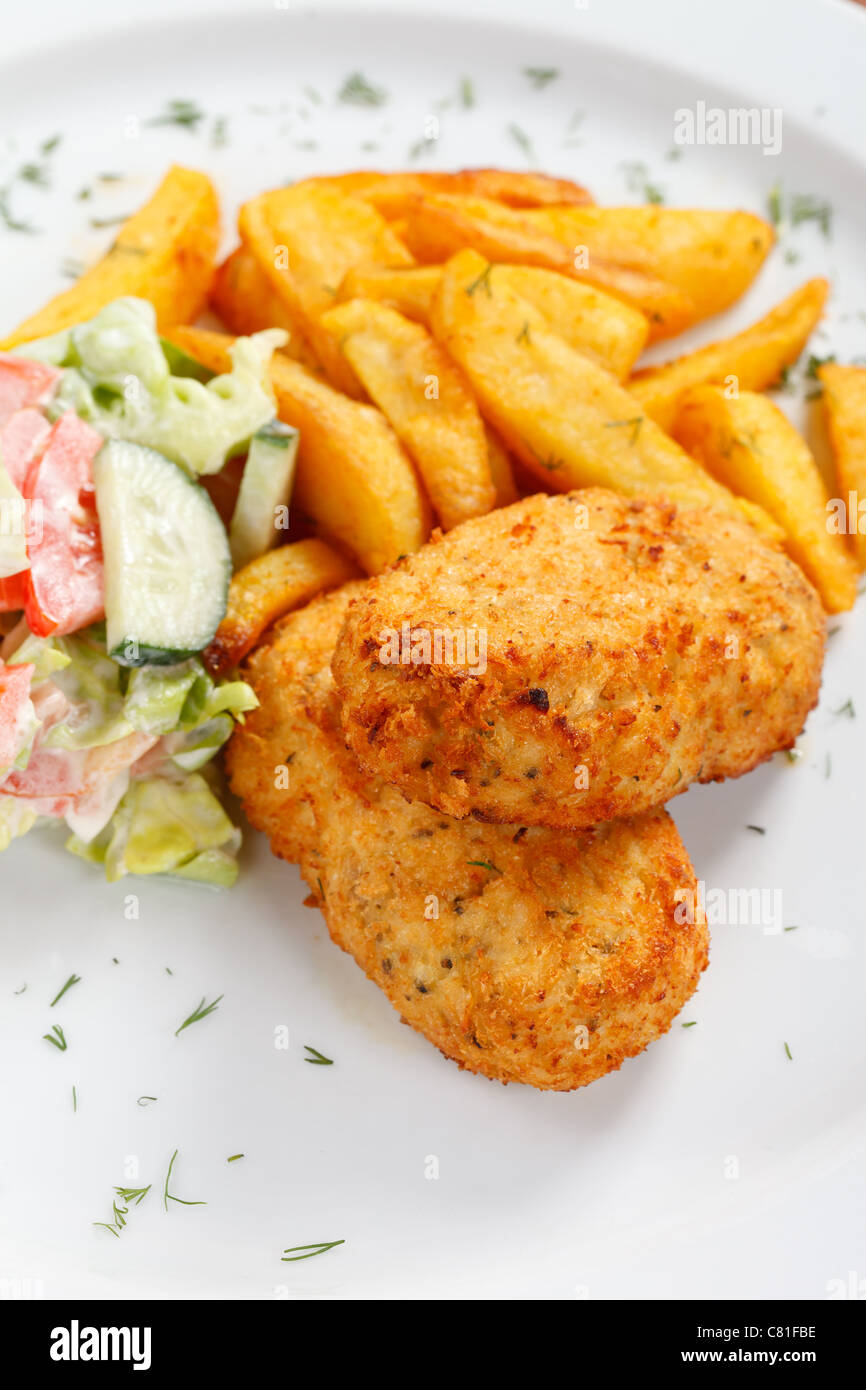 chicken cutlet with fried potatoes Stock Photo Alamy