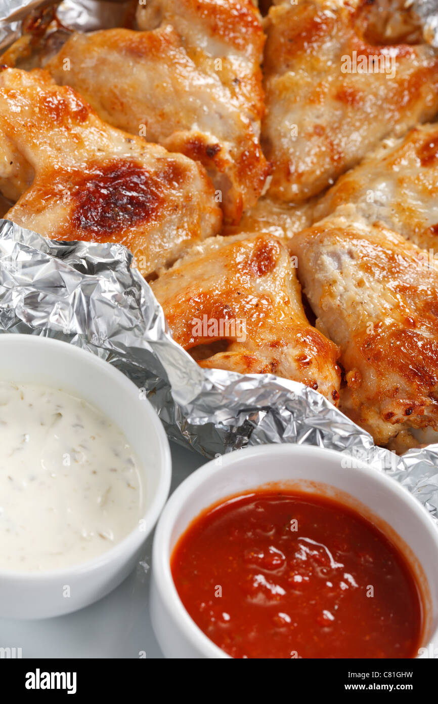 Chicken wings with sauce Stock Photo - Alamy
