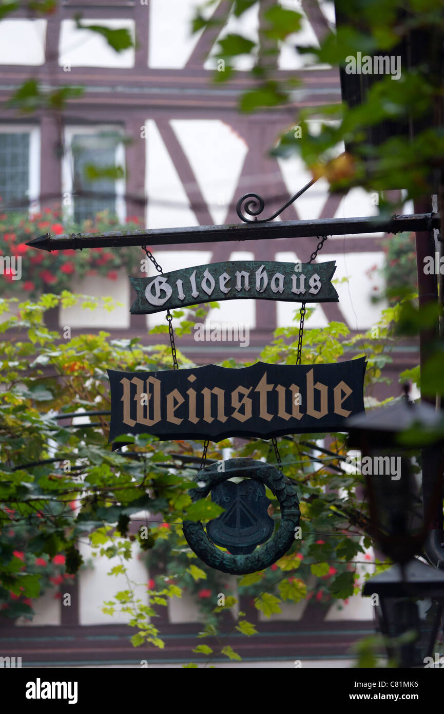 Traditional sign outside wine shop in Bernkastel-Kues village on River Mosel in Mosel valley in Germany Stock Photo