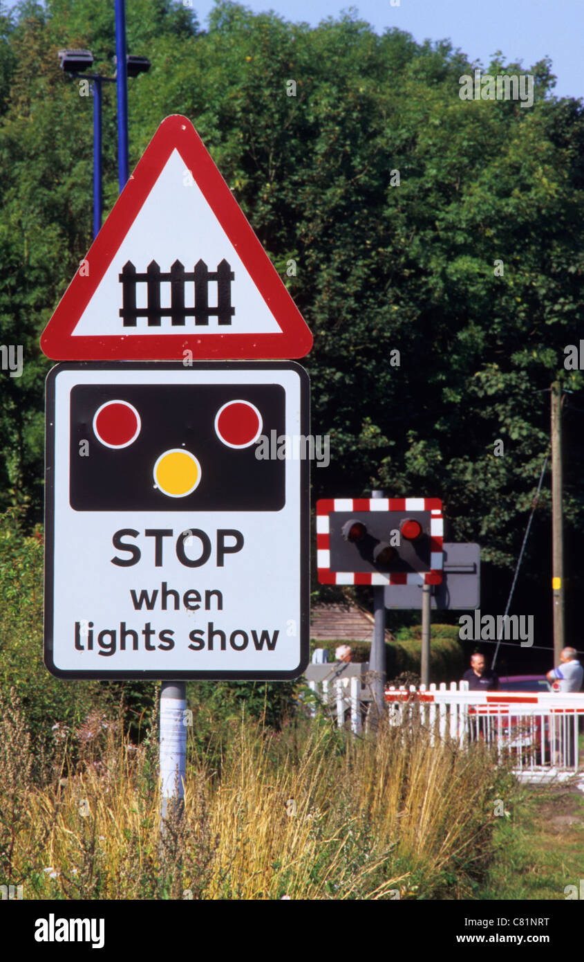 Cars Waiting By Level Crossing As Lights Flash And Barriers Descend Warning Of Approaching Train Near Leeds Yorkshire Uk Stock Photo Alamy Cars Waiting By Level Crossing As Lights Flash And Barriers Descend Warning Of Approaching Train Near Leeds Yorkshire Uk Stock Photo Alamy