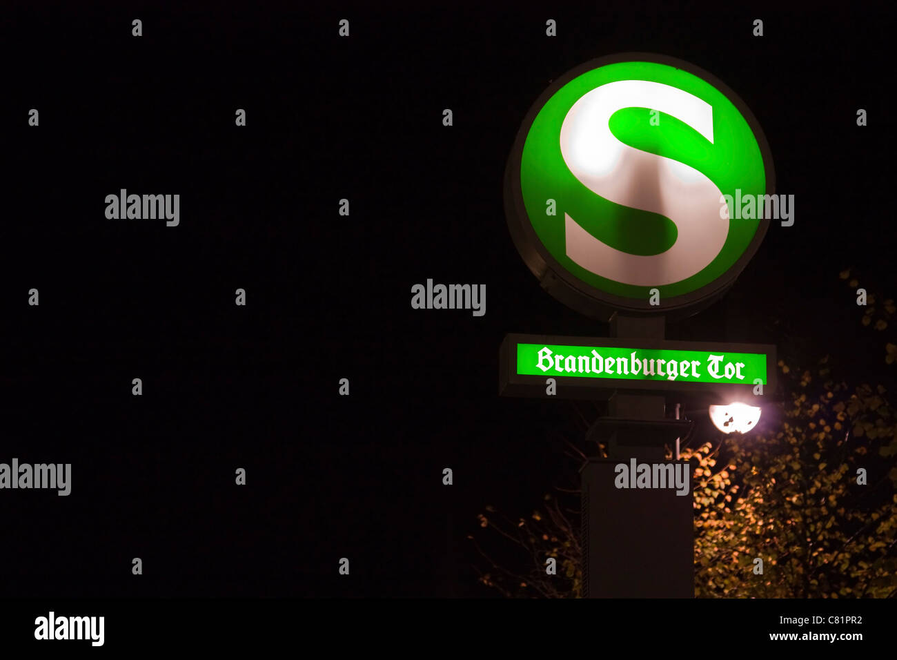 Image taken at night of an Surface rail station sign of the Brandenburg Gate in Berlin in October 2010. Stock Photo