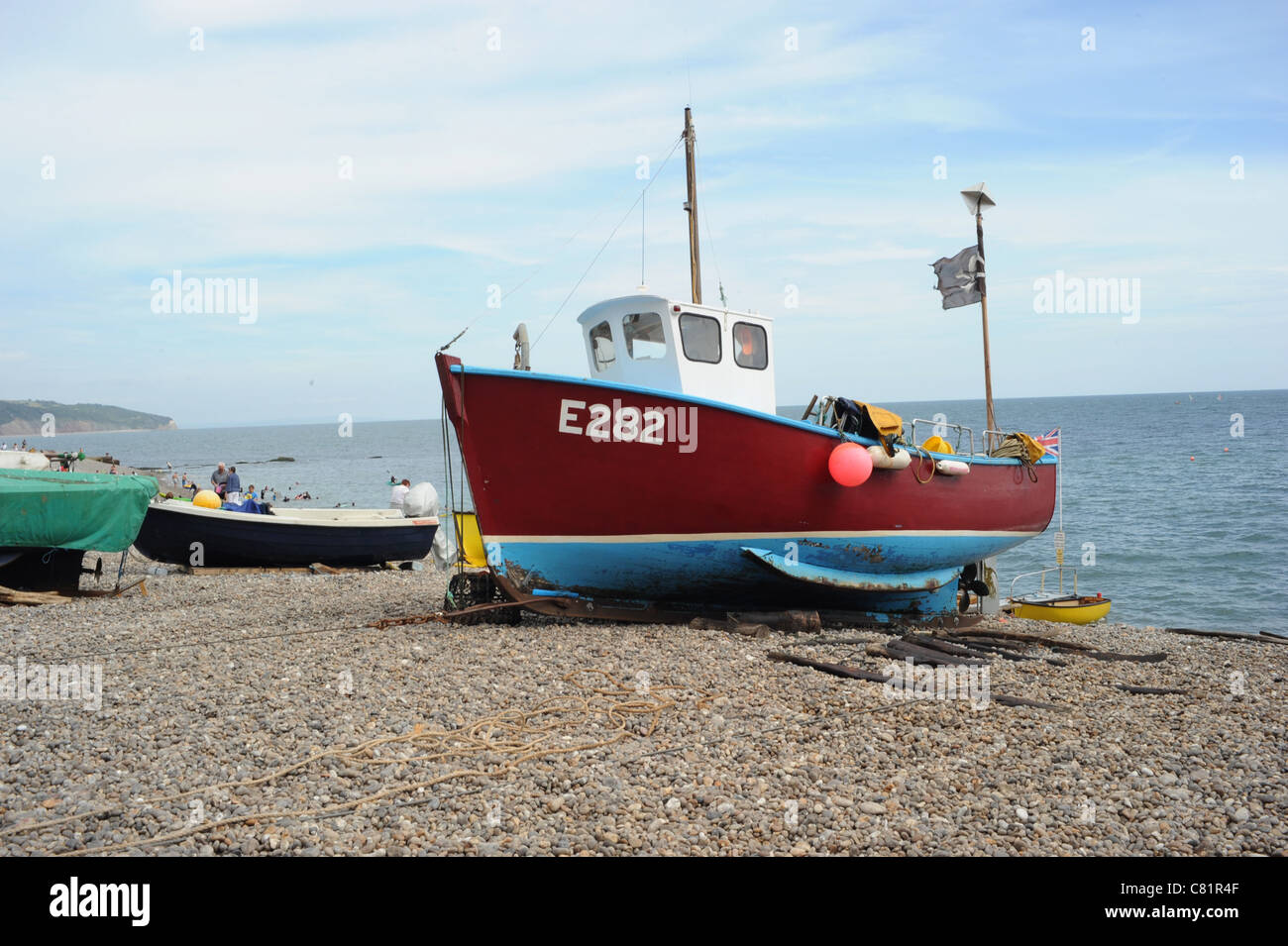 Boats on Beer Beach, Devon England Stock Photo