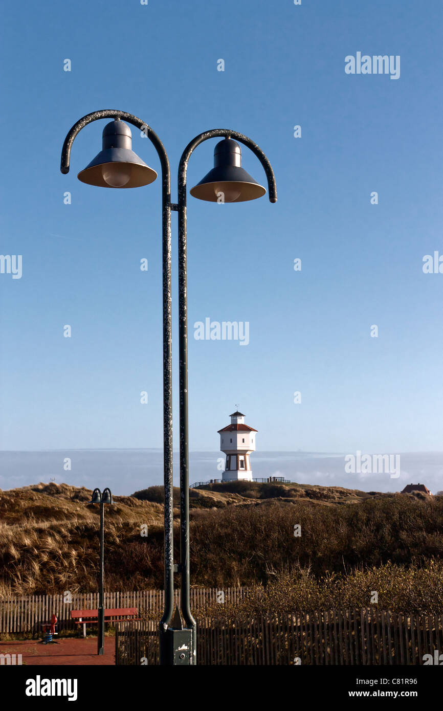 Lamps with the Langeoog's water tower in the background Stock Photo