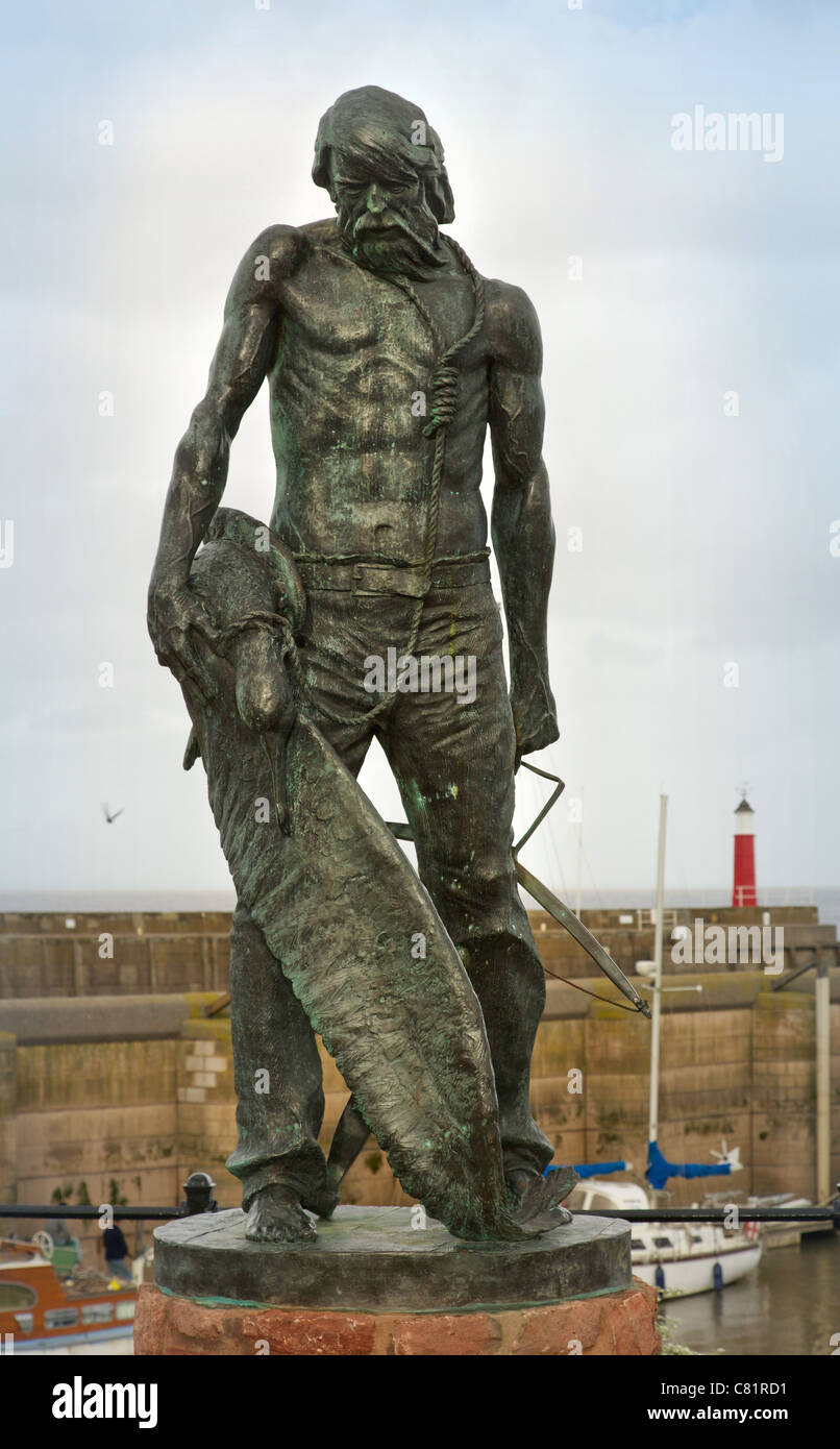 Bronze scuplture of Coleridge's Ancient Mariner in Watchet harbour on the Somerset coast Stock Photo