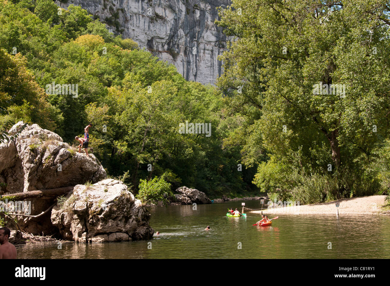 People swimming and canoeing in the river of Aveyron, StAntoninNobleVal,