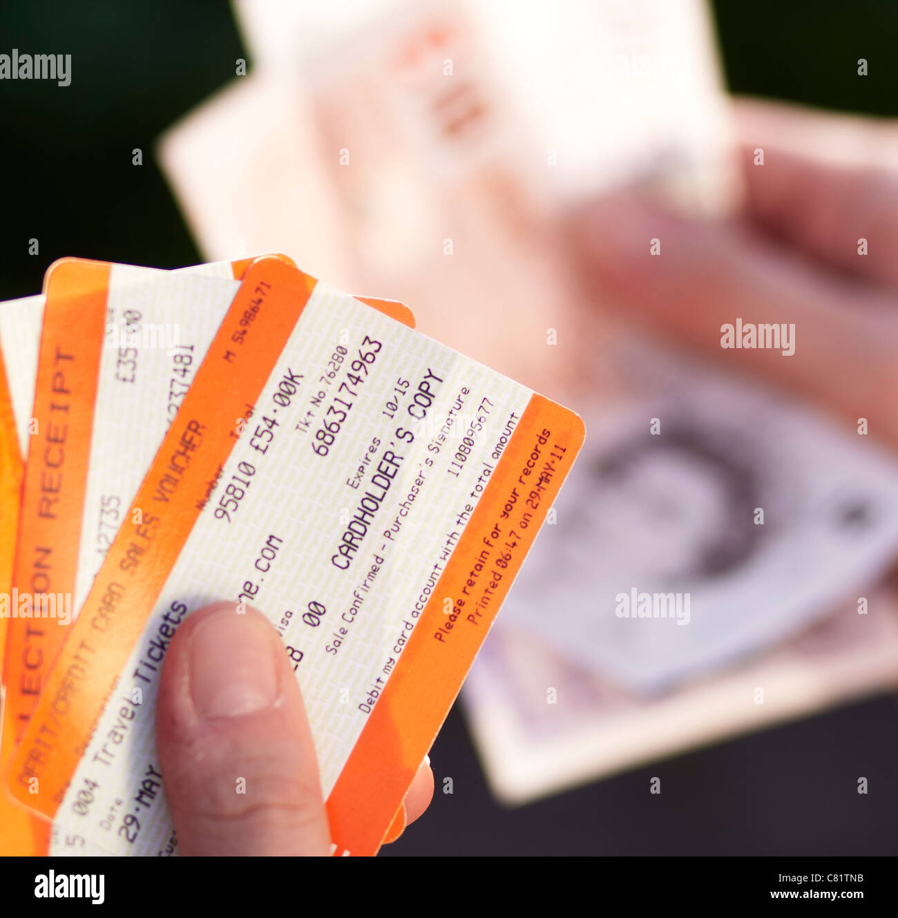 Person holding train tickets Stock Photo