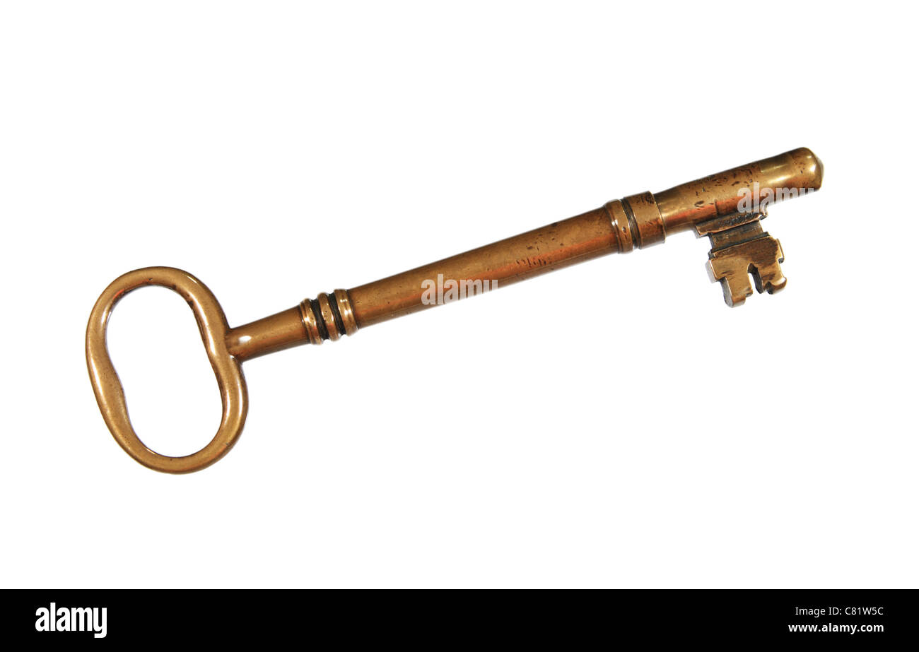 large antique brass key isolated on white Stock Photo Alamy