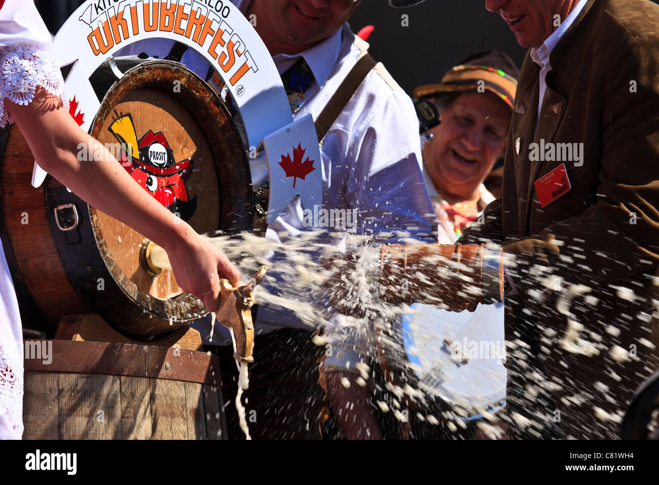 Tapping the first beer barrel Oktoberfest 2011 Kitchener Canada Stock Photo