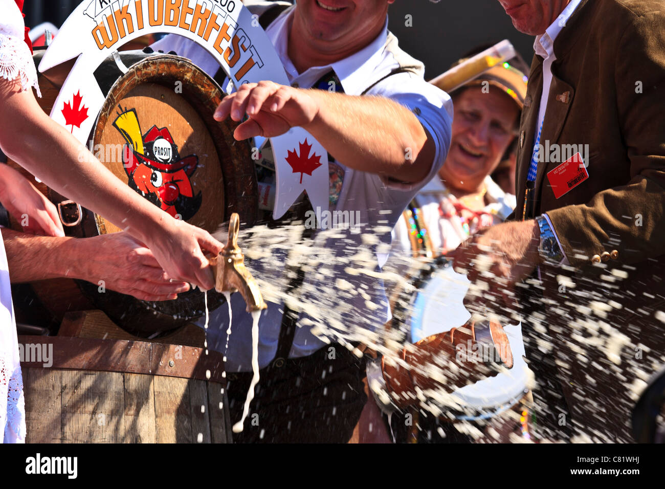 Tapping the first beer barrel Oktoberfest 2011 Kitchener Canada Stock