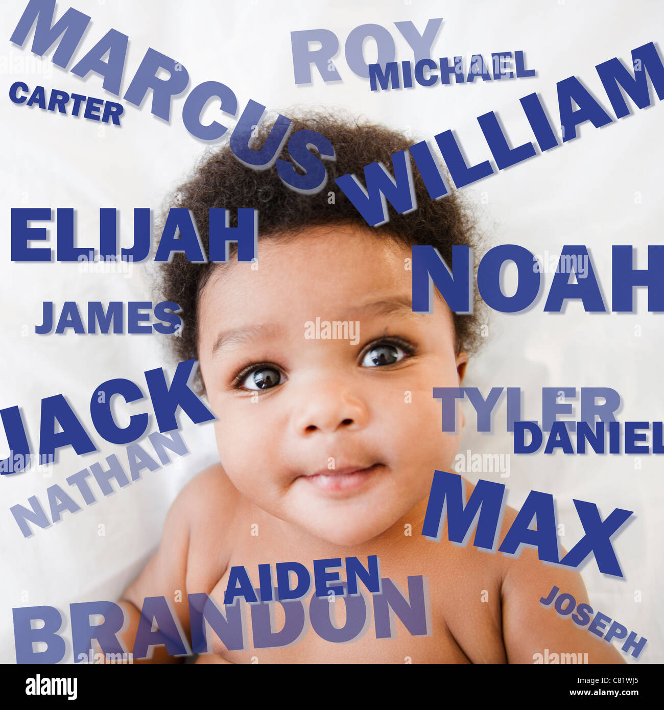 African American baby boy surrounded by boy's names Stock Photo