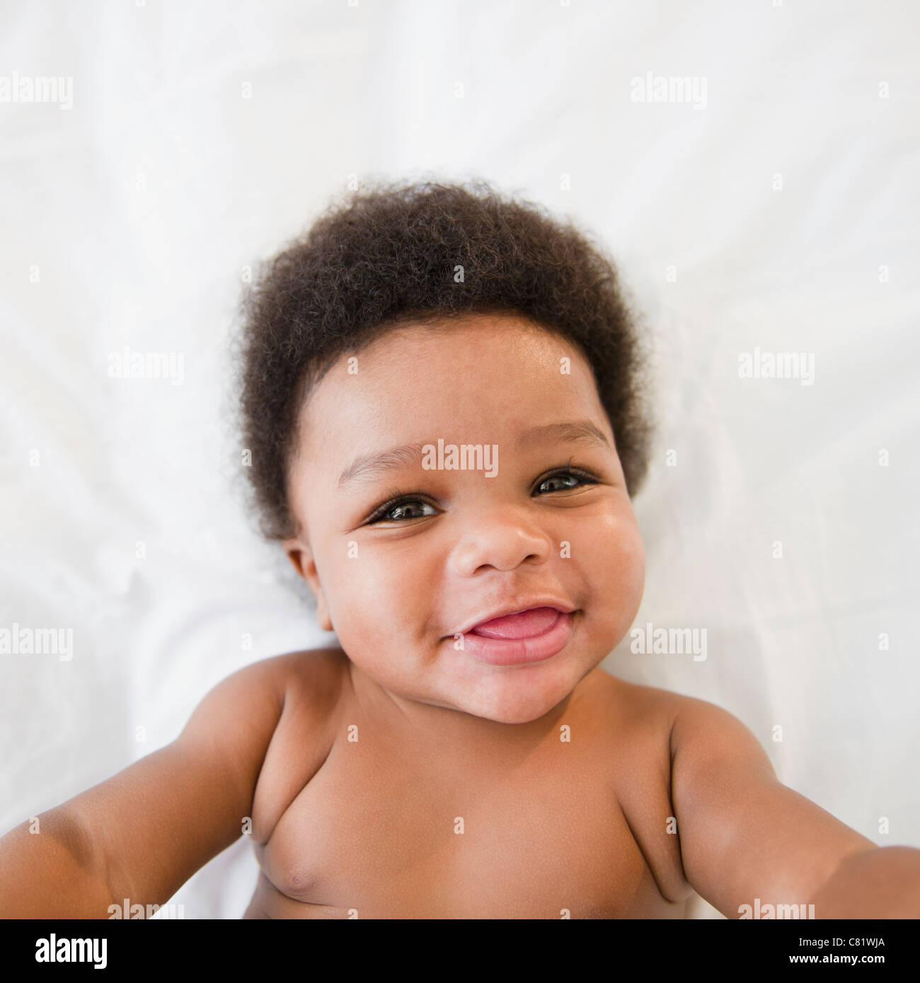 Smiling African American baby boy Stock Photo