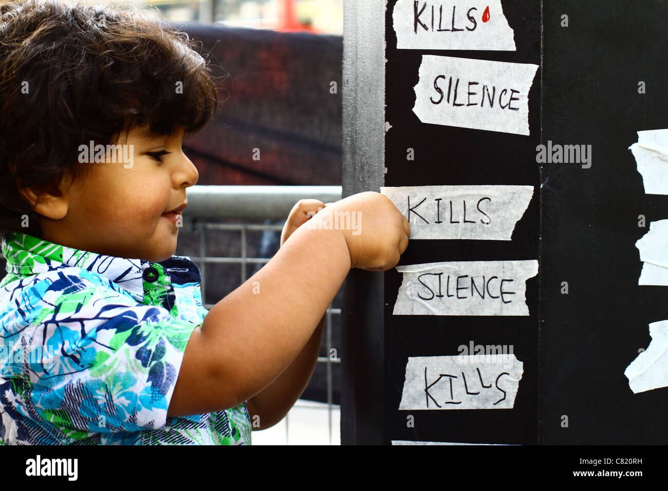 A young boy at a silent protest in London to highlight the political situation in Yemen. Stock Photo