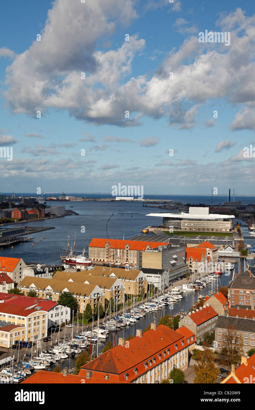 Aerial view of the inner harbouf of Copenhagen. The old famous noma restaurant in the red tiled former warehouse in centre and the Copenhagen Opera Stock Photo