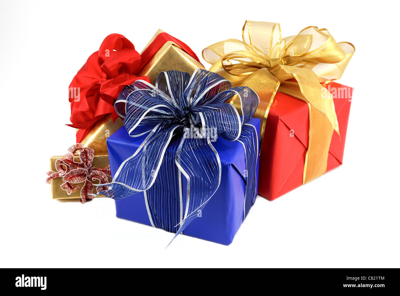 Four gift wrapped Christmas packages on a white background Stock Photo