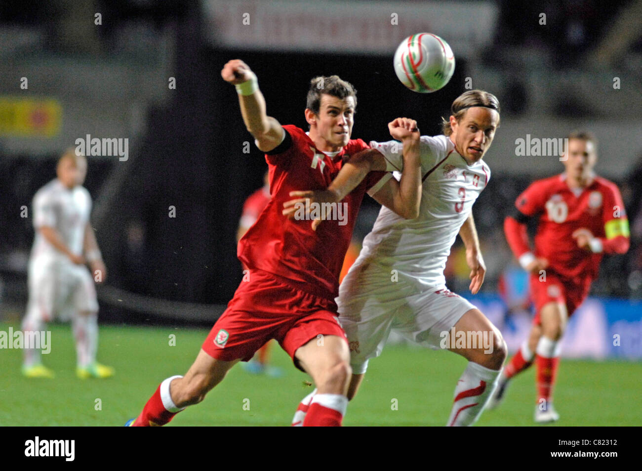 Wales Gareth Bale and Reto Ziegler of Switzerland. (editorial use only) Stock Photo