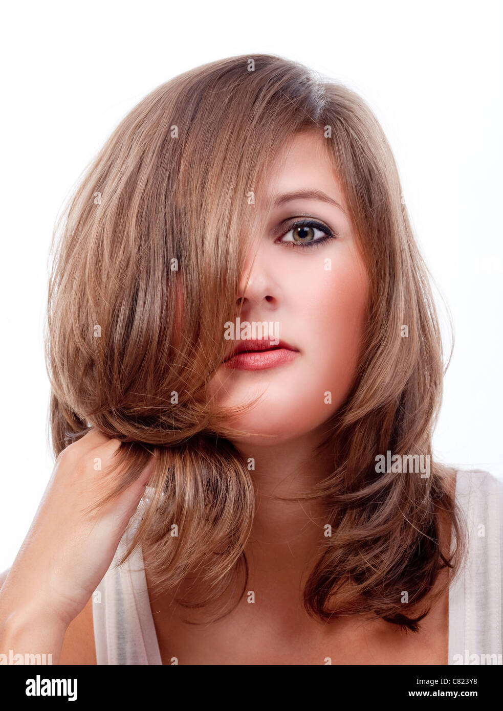 portrait of a young woman with brown hair - isolated on white Stock ...